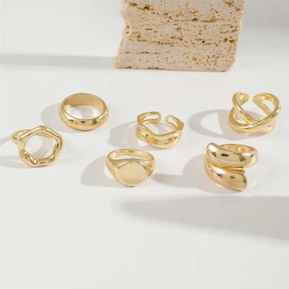 Radiant Bands: Gold Open Rings